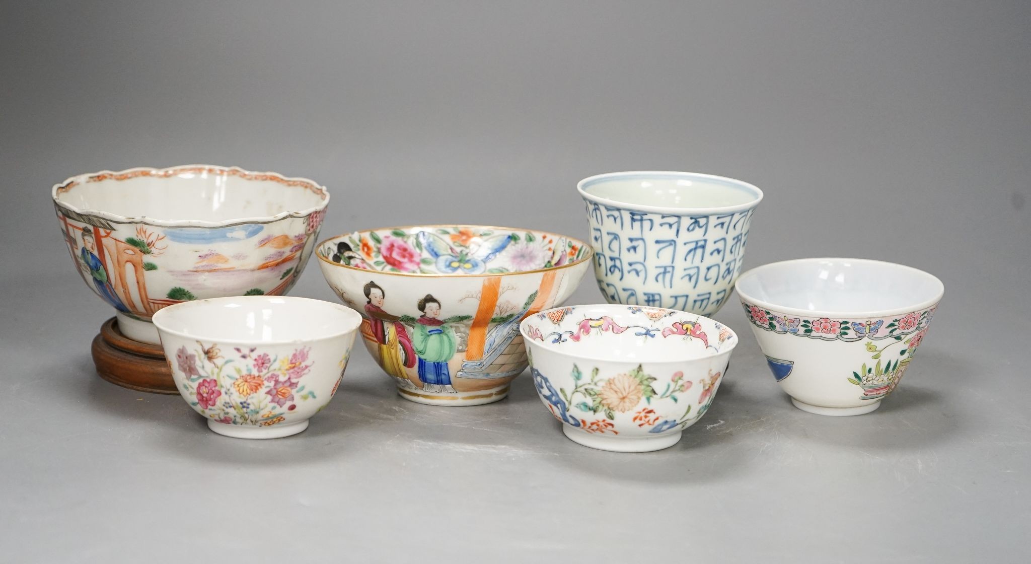 Six Chinese bowls or cups, 18th century or later, largest 11cm diam.